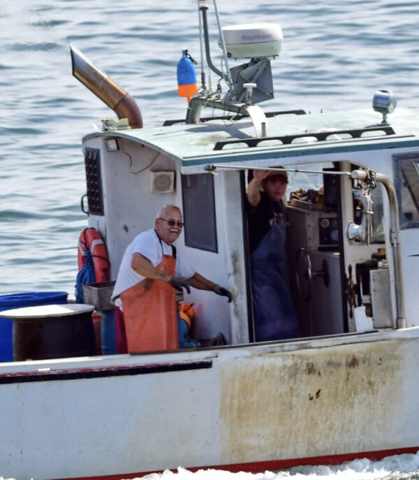 Steve Hope, Harbormaster in New Harbor, ME on his lobster boat